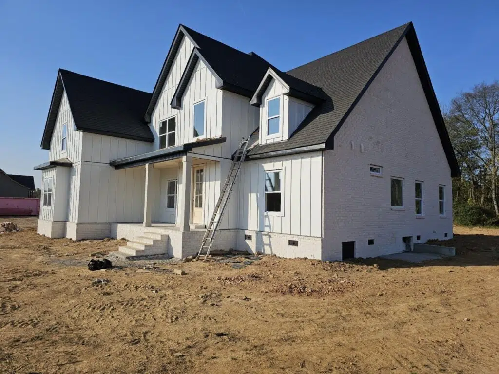 White Farmhouse being built in Wofford Estates.